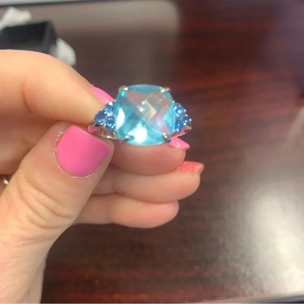 Avon Emmy cocktail ring with gemstone accents sz 10 aquamarine silver tone